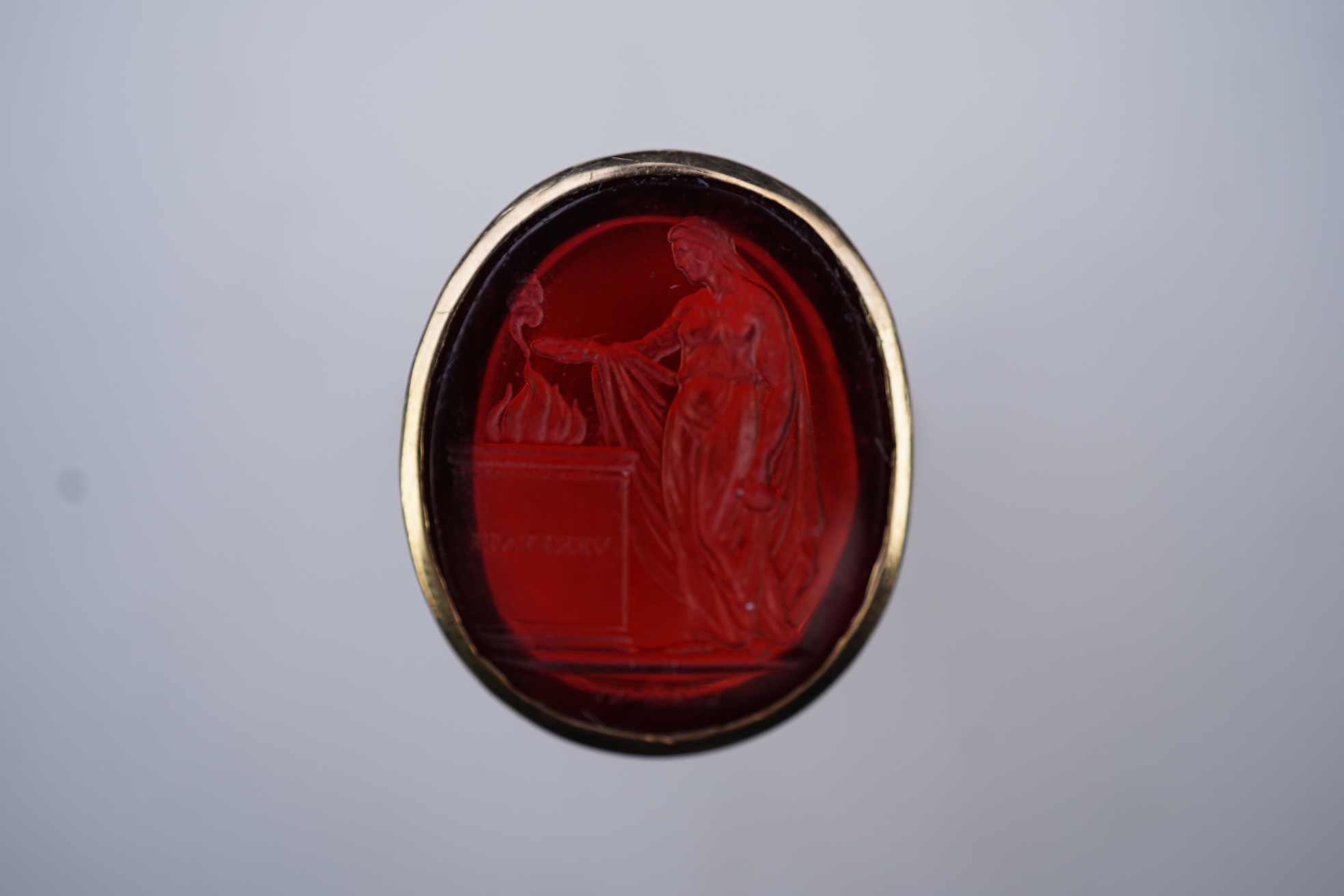 A glass intaglio ring, early 20th century